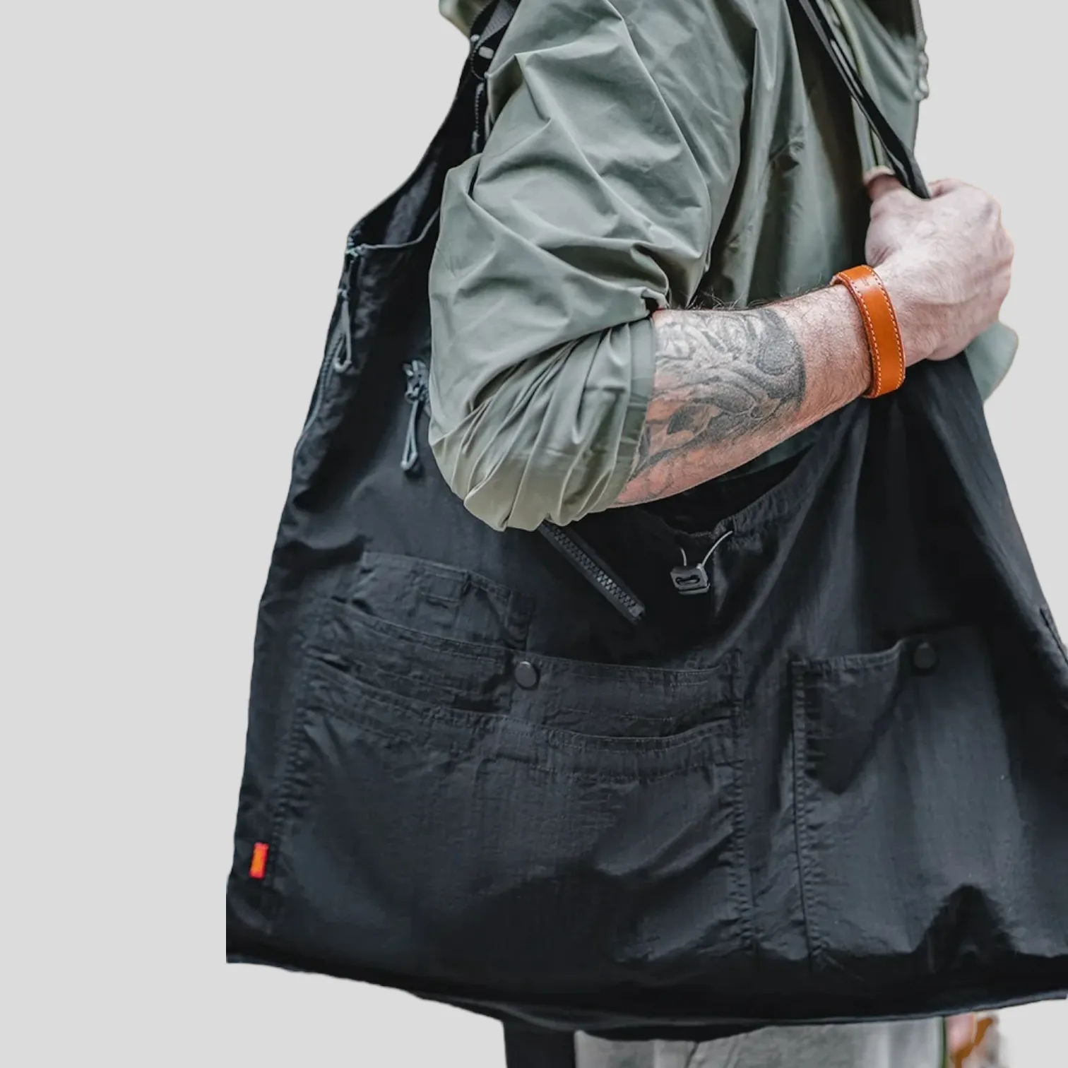 Convertible tote bag tactical vest