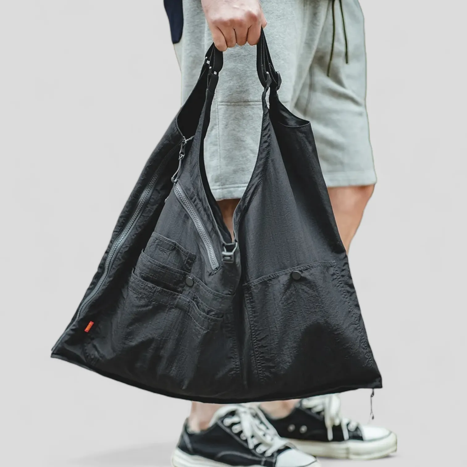 Convertible tote bag tactical vest